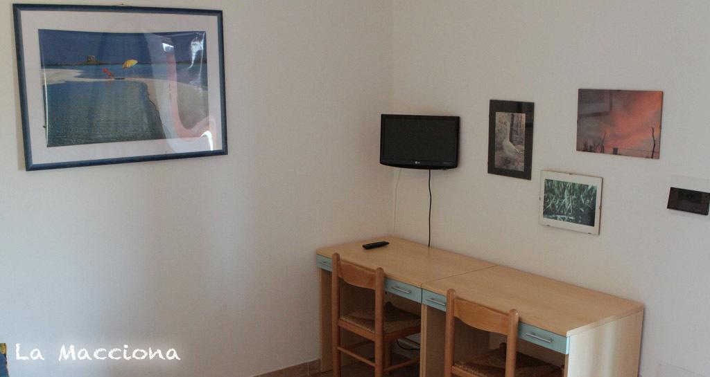 Apartamento La Macciona Aglientu Habitación foto