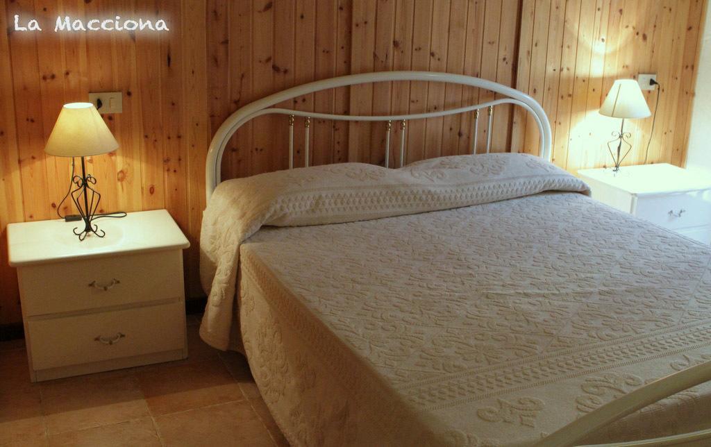 Apartamento La Macciona Aglientu Habitación foto